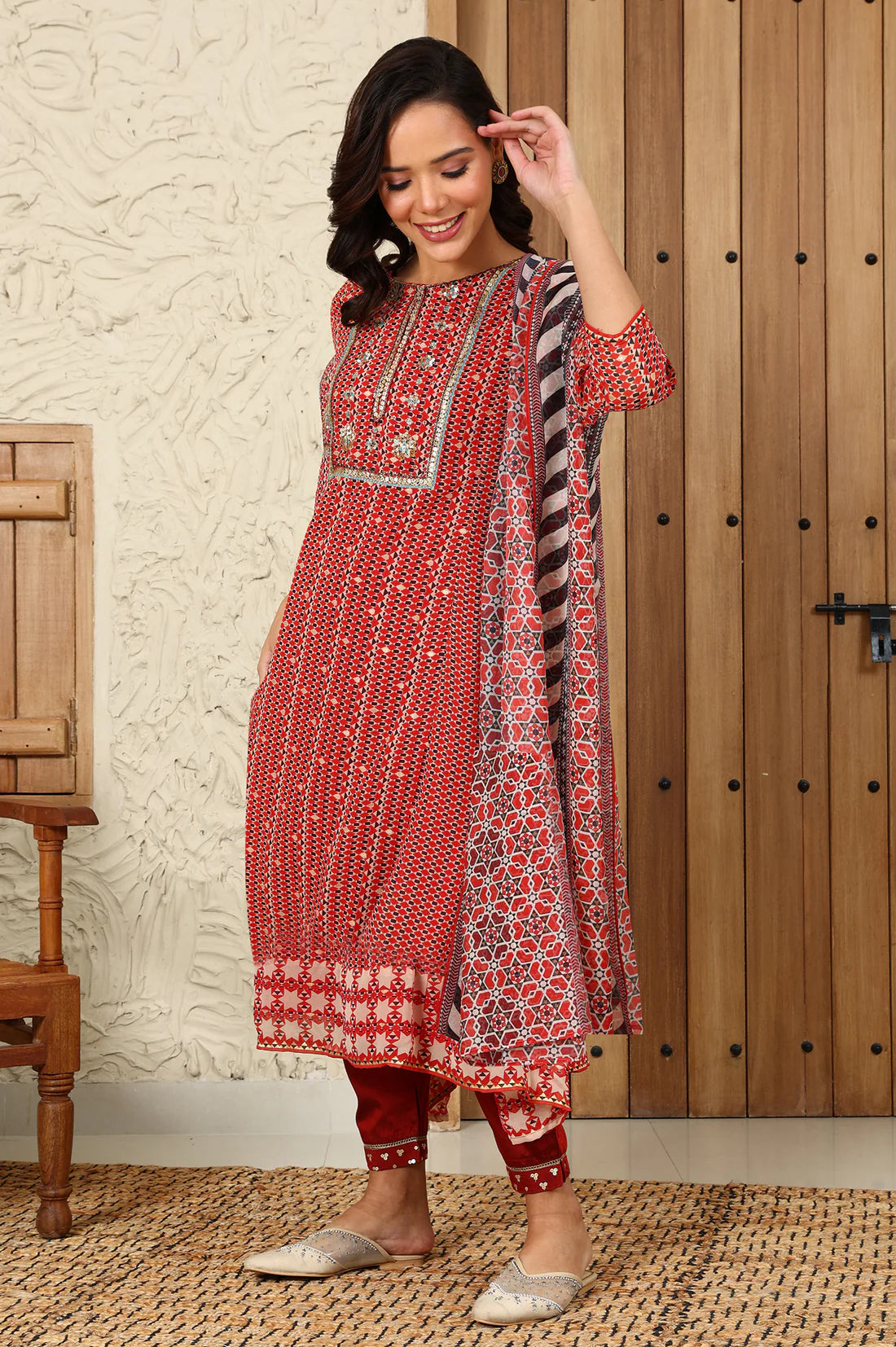 Contemporary Rust Red Flared Kurta, Pants and Dupatta Set with Geometric Prints and Elegant Embroidery for Special Occasions and Celebrations