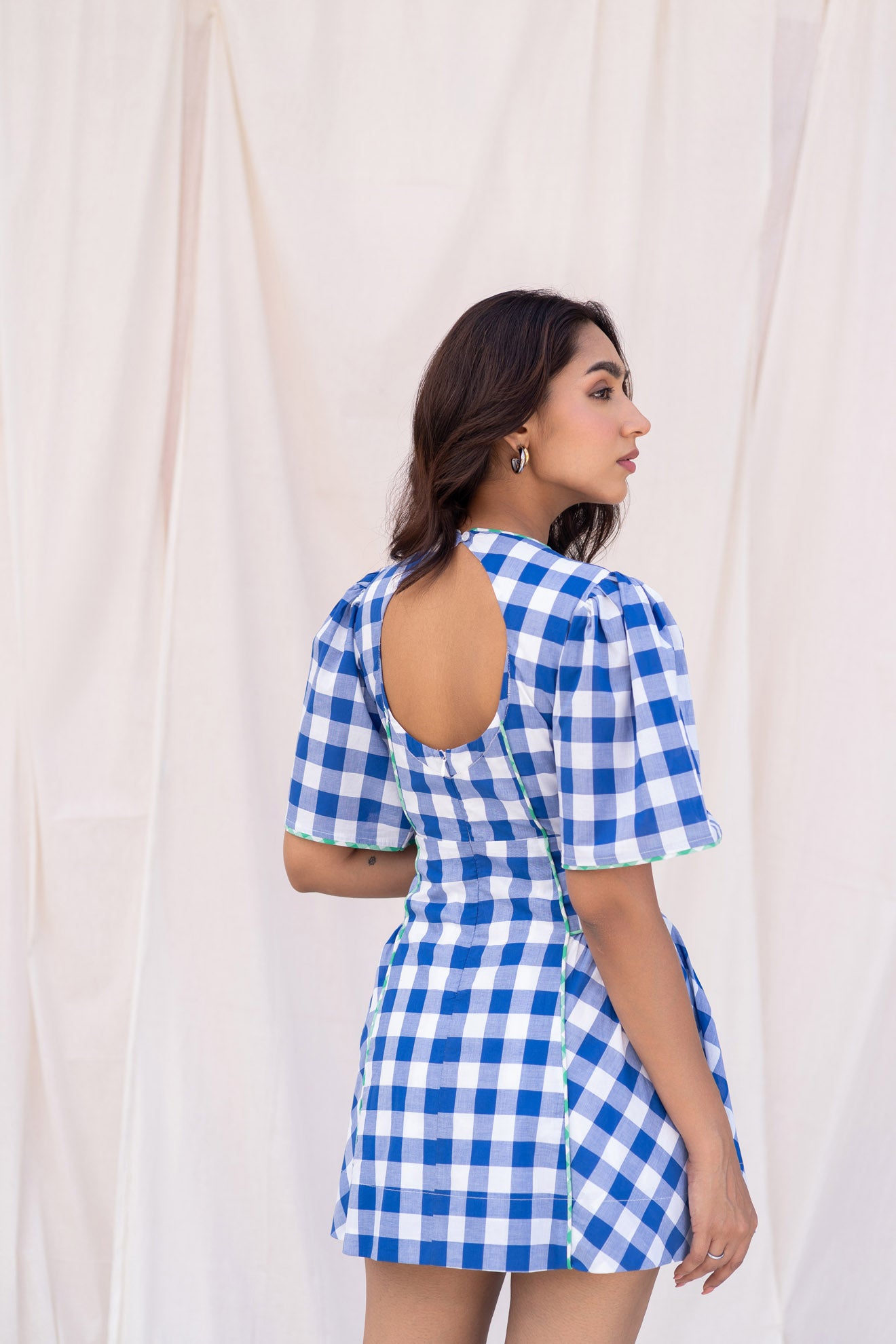 Fashionable Blue Checks Dress with Short Hemline and Heart Cut-Out Design