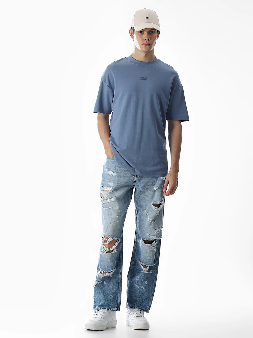 Loose Fit Casual Light Blue Jeans for Men with Heavy Worn and Distressed Look