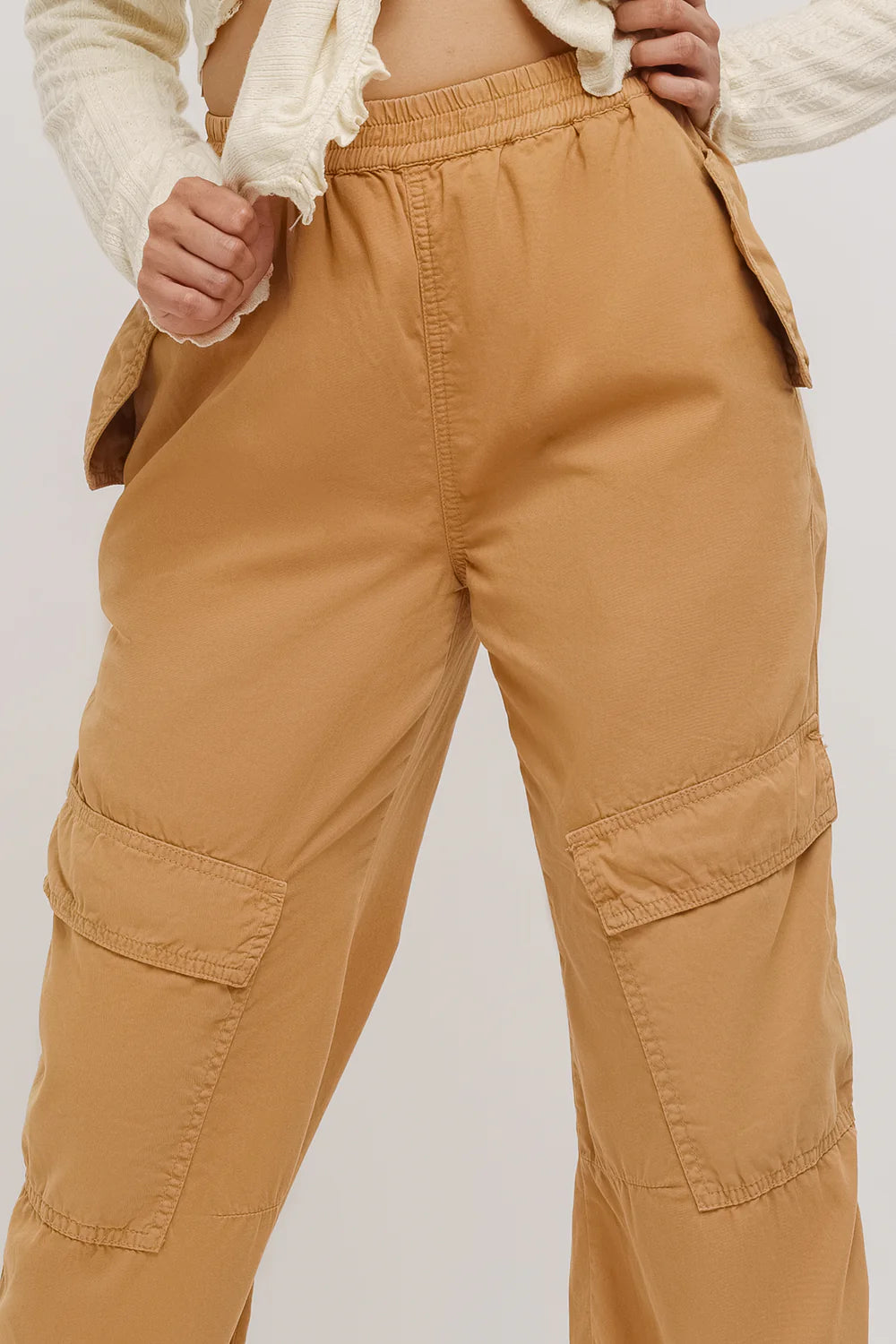 Fashionable Women’s Sand Cargo Pants with Tapered Fit and Modern Minimalistic Style