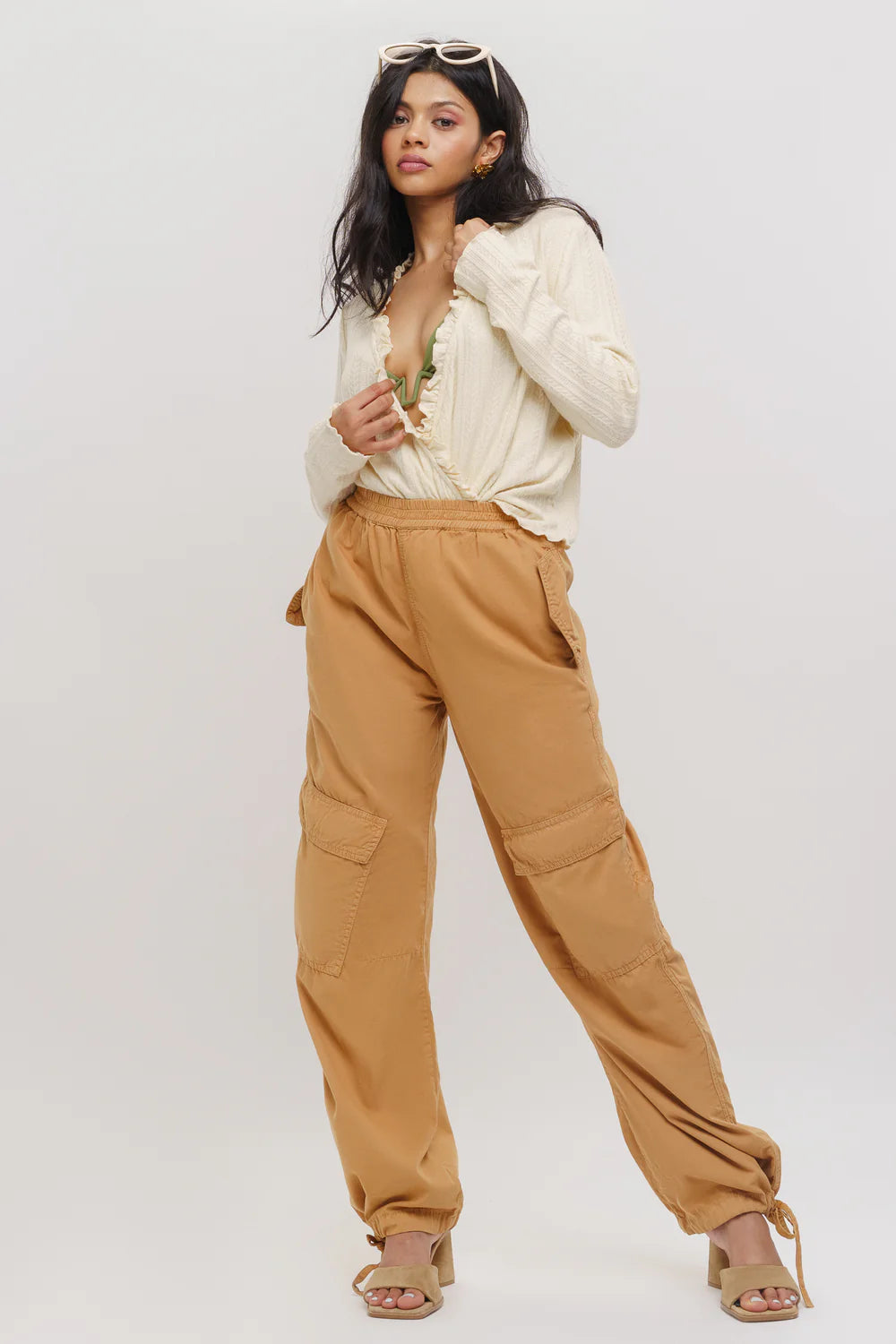Fashionable Women’s Sand Cargo Pants with Tapered Fit and Modern Minimalistic Style