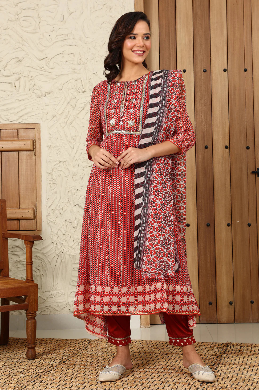Contemporary Rust Red Flared Kurta, Pants and Dupatta Set with Geometric Prints and Elegant Embroidery for Special Occasions and Celebrations