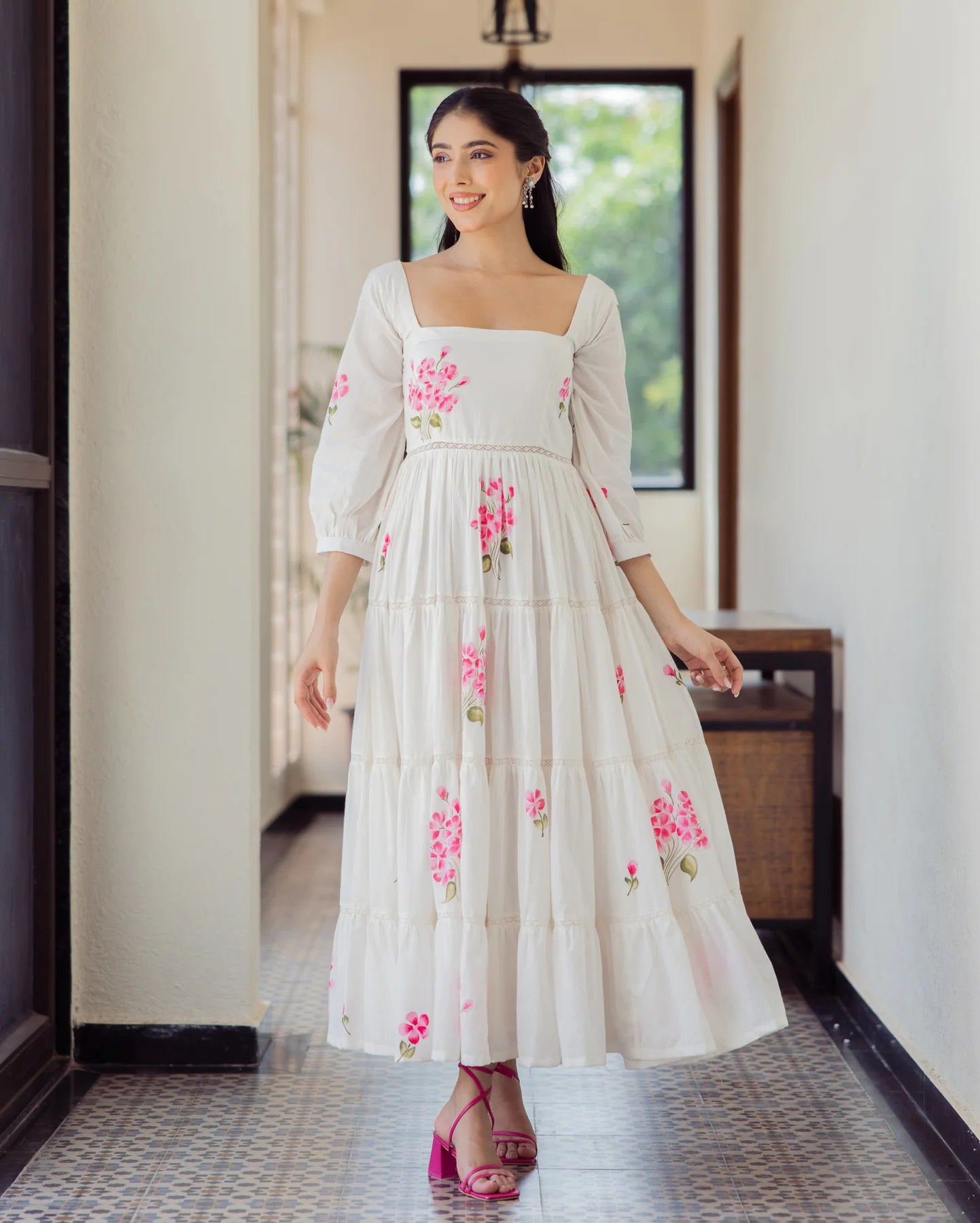 Elegant White Handpainted Cotton Dress with Soft Fabric and Flowing Hemline