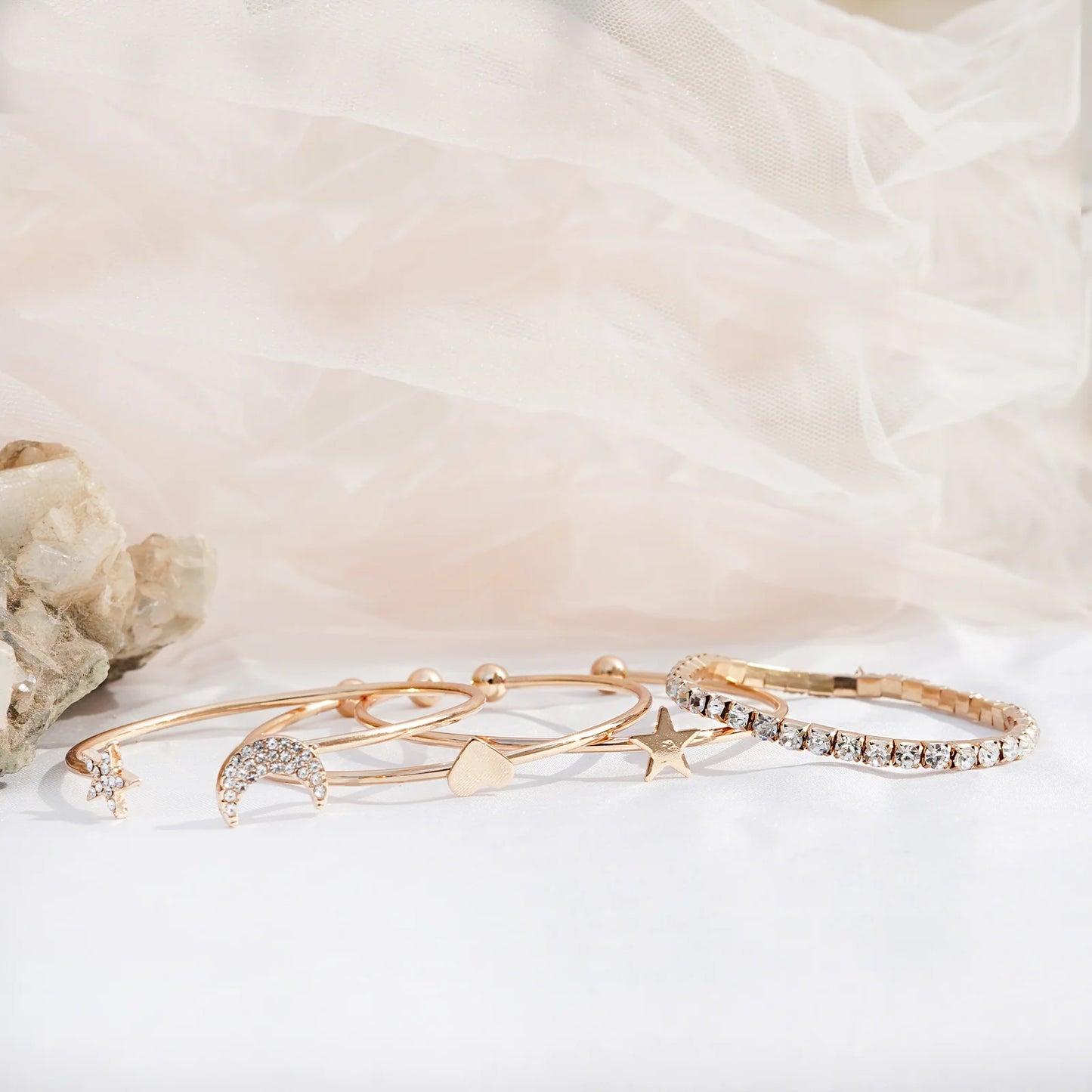 Set of 4 Gold Bracelets Magic Trick Design Stylish and Fun Jewelry for Women