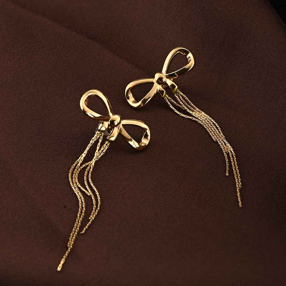 Fashionable Gold Bow and Tassel Earrings for Women Sophisticated and Eye-Catching