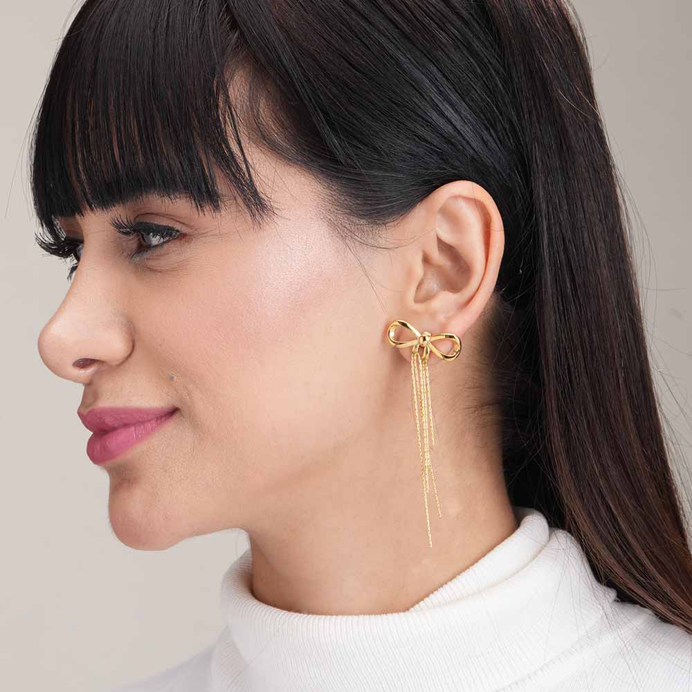 Fashionable Gold Bow and Tassel Earrings for Women Sophisticated and Eye-Catching