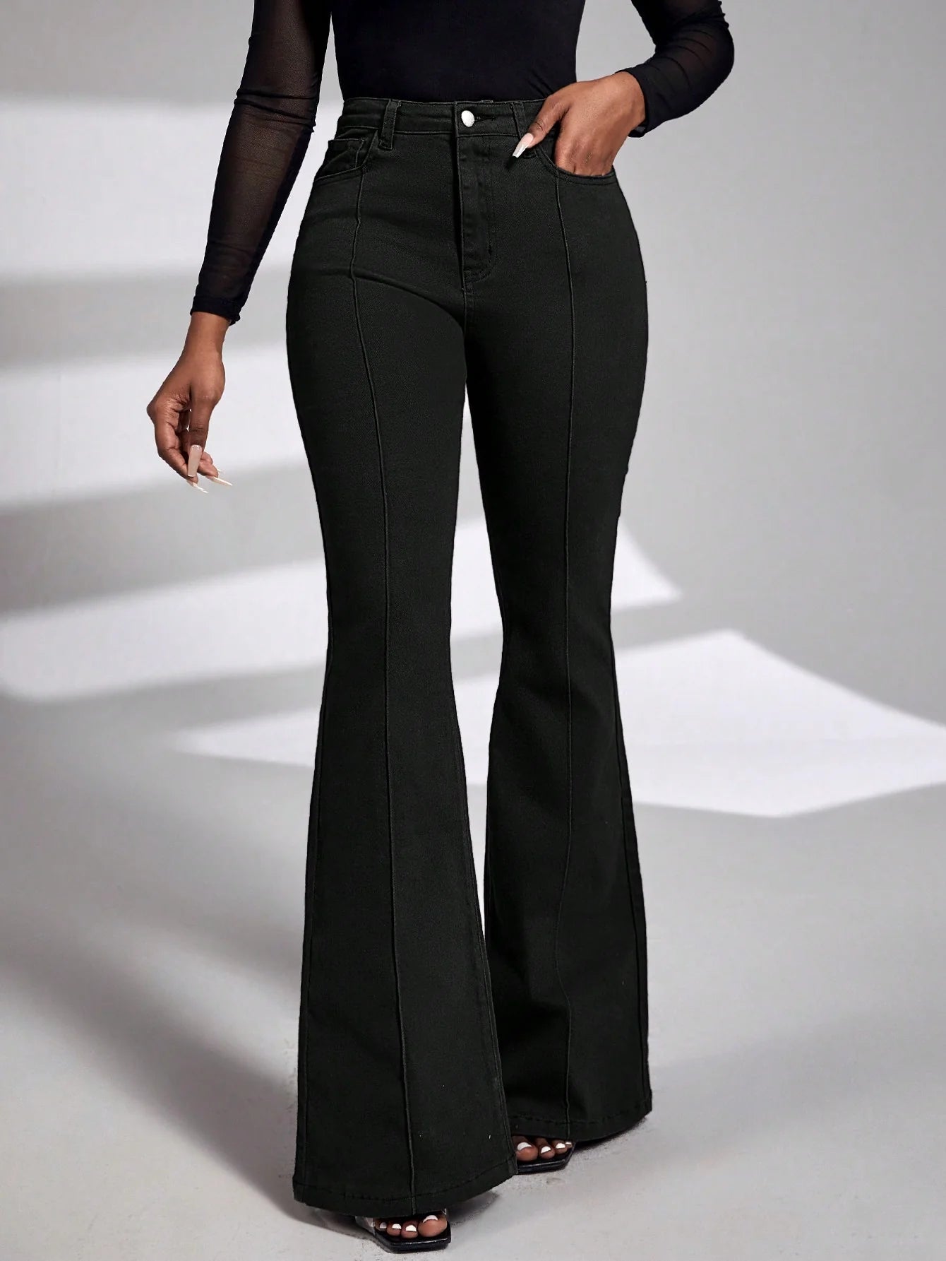 Stylish Women’s Black Affair Flare Jeans Perfect for Street Style and Casual Outings